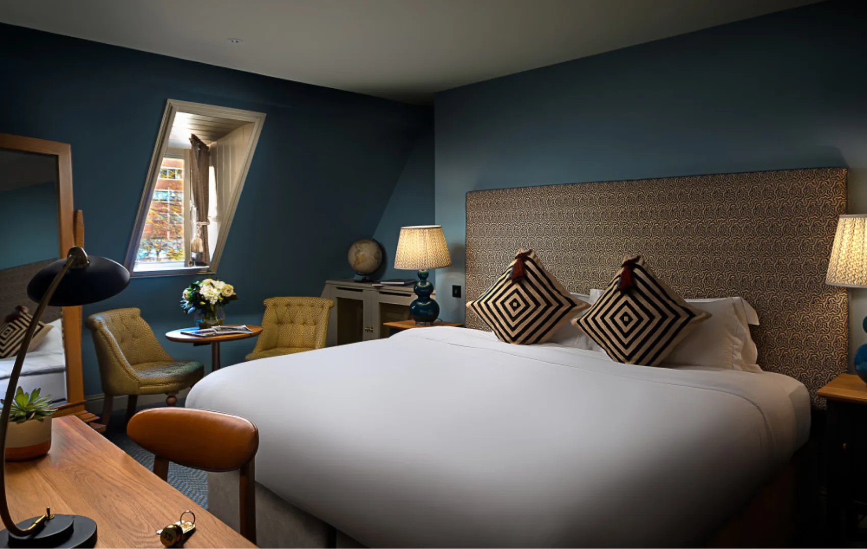 Cosy hotel room with a king-size bed at Schoolhouse Hotel Dublin