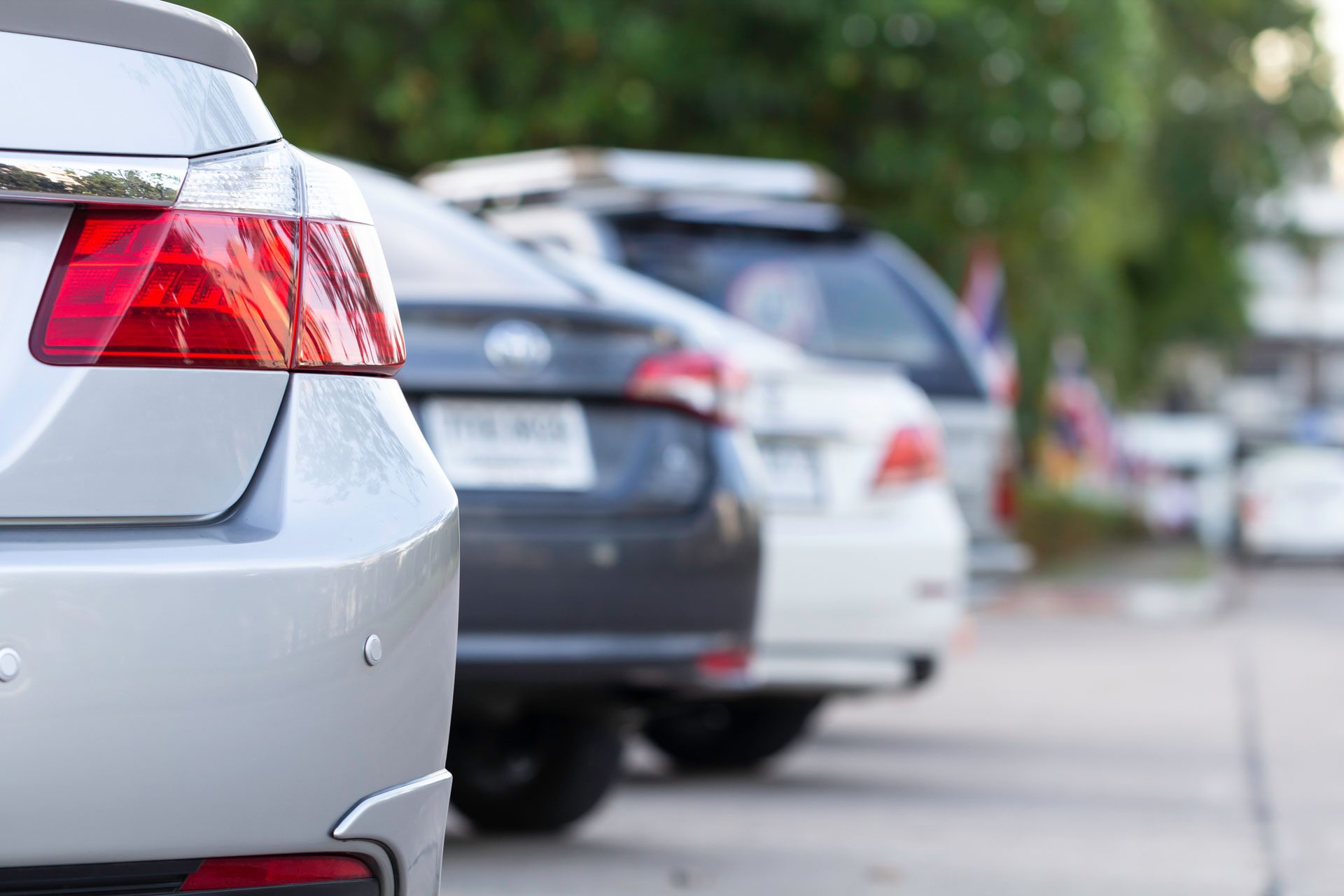 Close up view of cars parked
